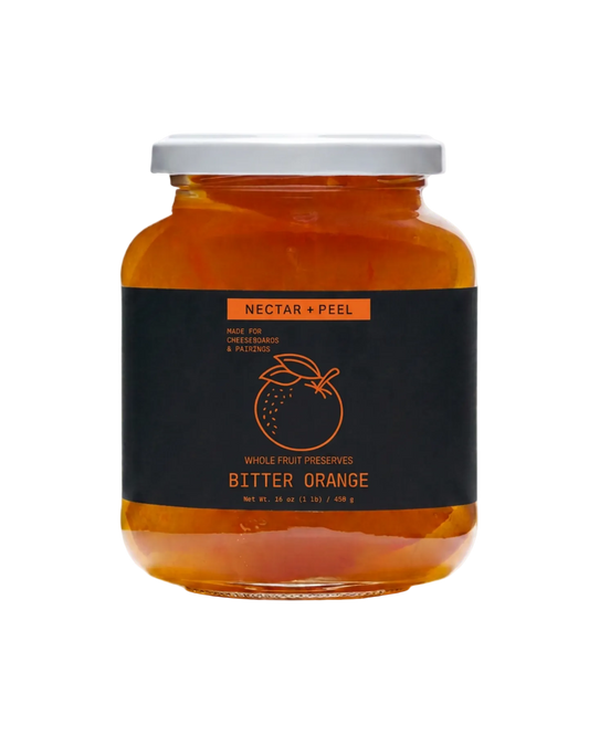 A glass jar of Bitter Orange Nectar + Peel by Pure Encapsulations, featuring a black label with orange text and a white lid, set against a clean white background.