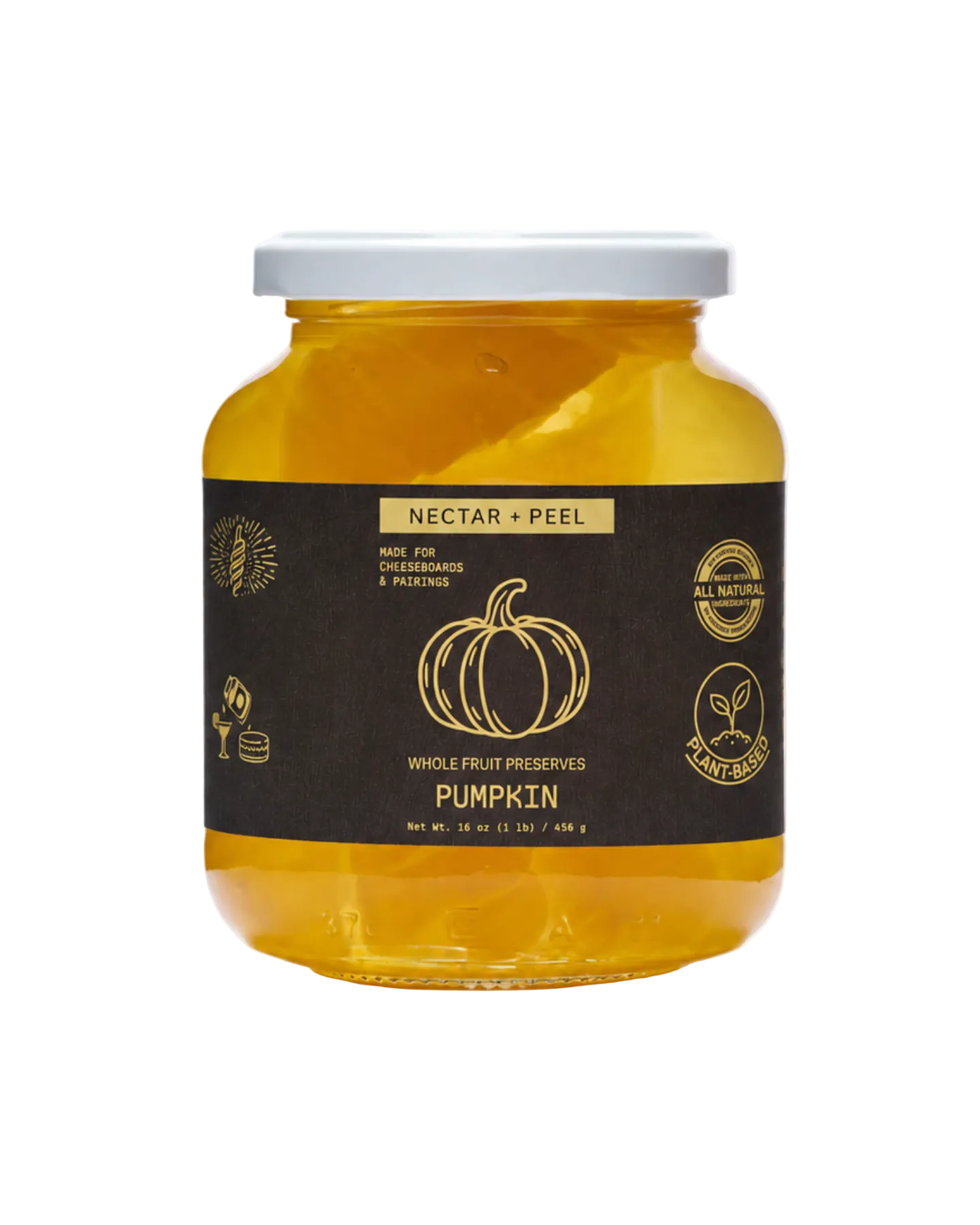 Jar of pumpkin preserve with a black label on a white background