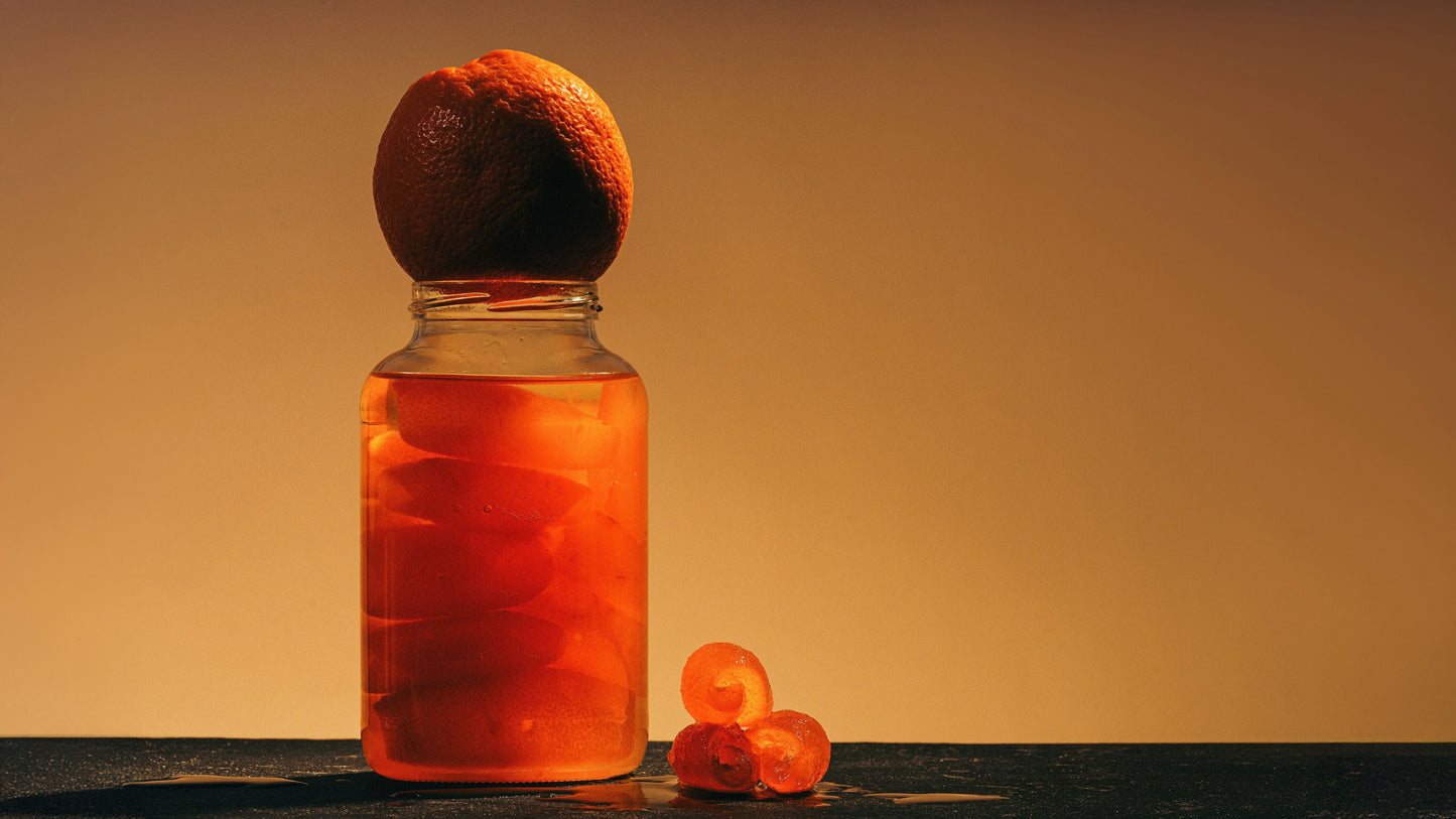 Bitter orange preserve in glass jar with whole citrus – Nectar + Peel