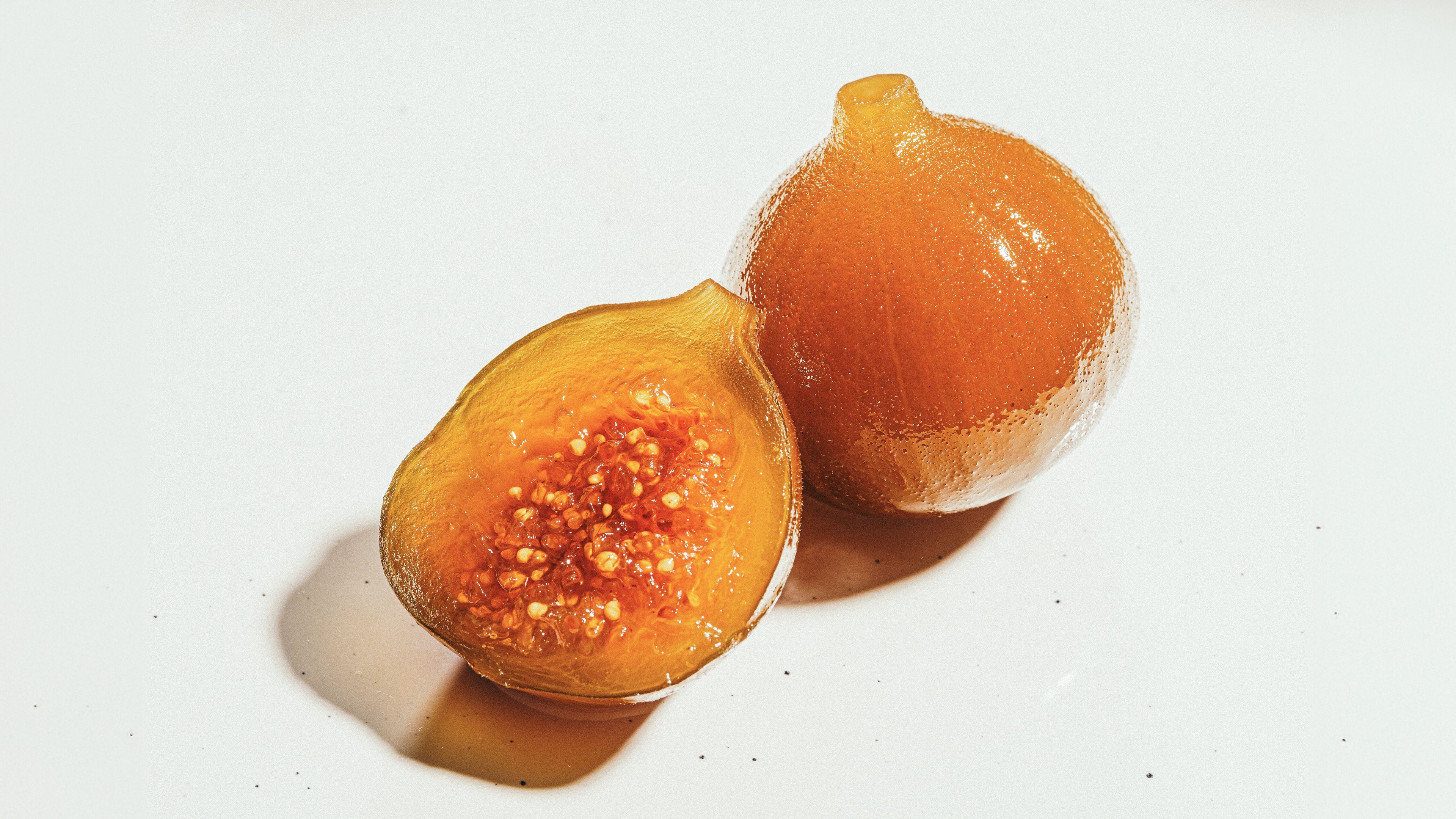 Whole fig preserve cut open showing interior texture – Nectar + Peel
